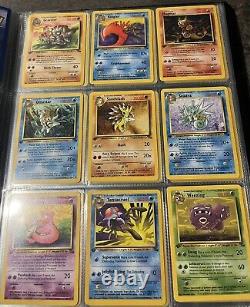 1st Edition Fossil Set Complete 62/62 NM Pokemon Cards In Charmander Binder