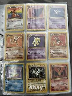 1st edition fossil 63/62 complete set Pokemon cards NM